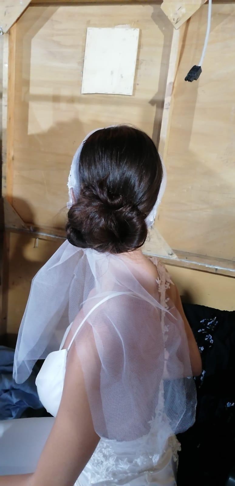 Chignon sposa con velo